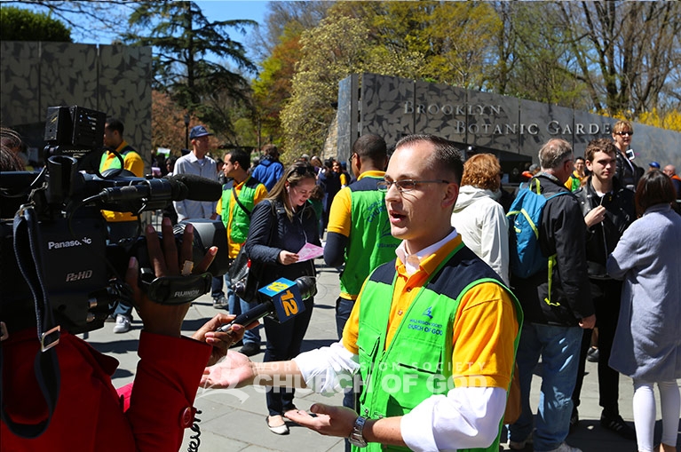 World Mission Society Church of God, Church of God, WMSCOG, green vest, yellow shirts, volunteers, volunteerism, brooklyn botanic garden, News12 Brooklyn, cherry blossom, cherry blossom festival, Sukura Matsuri