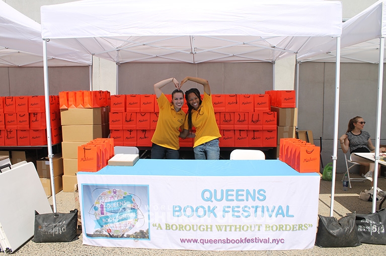 Church of God volunteers prepare to serve visitors of the Queens Book Festival.